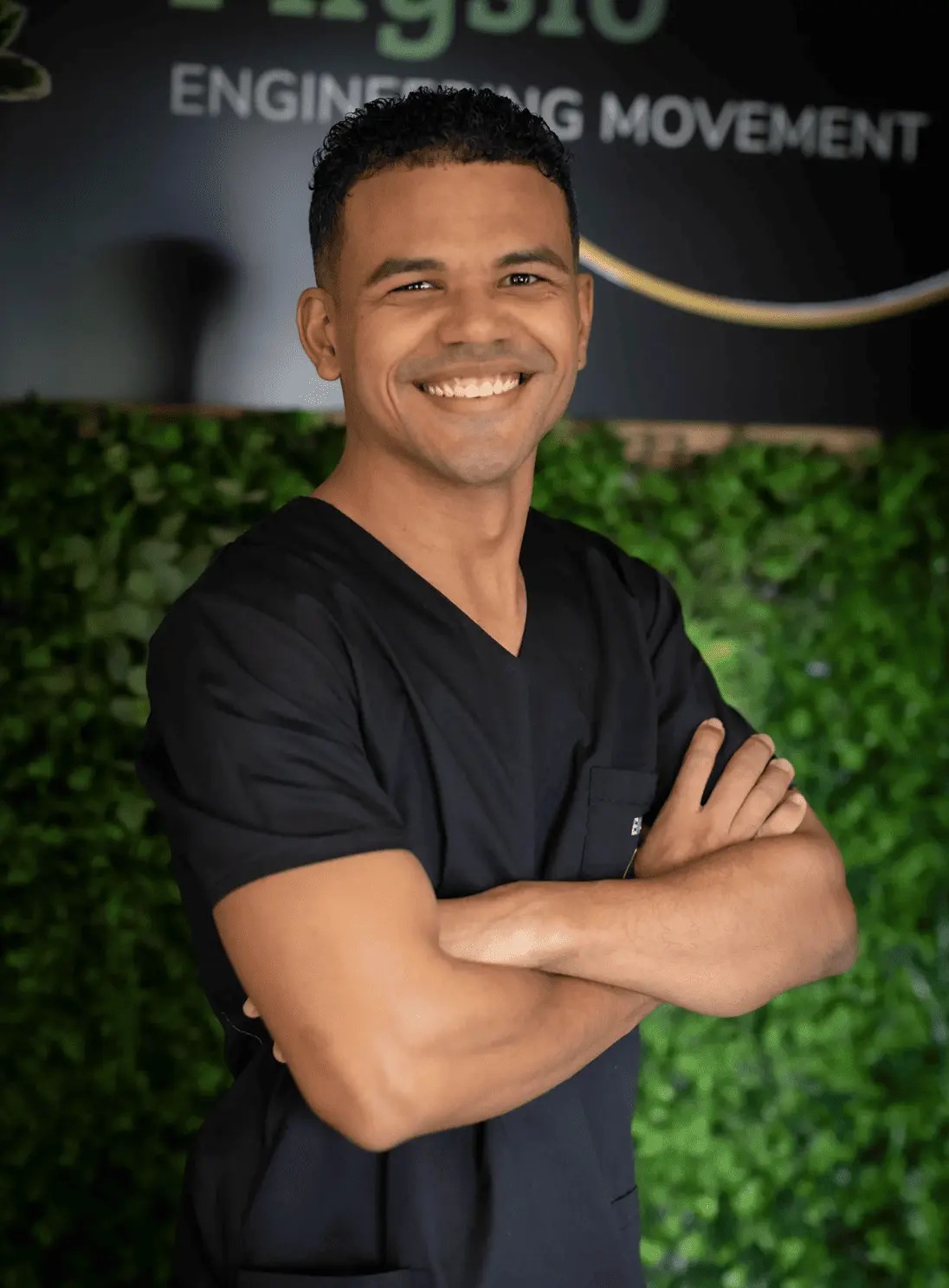 Evan Schuman, senior physiotherapist at Floyd Lebatie Physio, pictured in black clinical scrubs